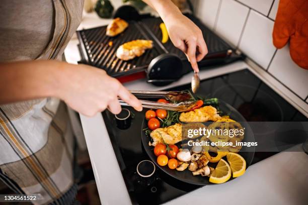 fresh meal on a plate - portion control stock pictures, royalty-free photos & images