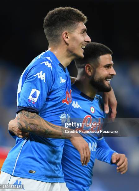 Giovanni Di Lorenzo of Napoli celebrates with team mate Lorenzo Insigne after scoring their side's second goal during the Serie A match between SSC...