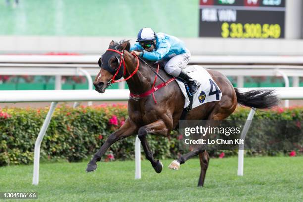 Jockey Matthew Poon Ming-fai riding All For St Paul's wins the Race 6 Yuen Chau Tsai Handicap at Sha Tin Racecourse on February 28, 2021 in Hong Kong.