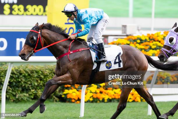 Jockey Matthew Poon Ming-fai riding All For St Paul's wins the Race 6 Yuen Chau Tsai Handicap at Sha Tin Racecourse on February 28, 2021 in Hong Kong.