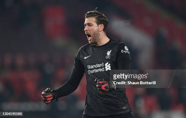 Adrian of Liverpool celebrates after their side's second goal scored by Roberto Firminho during the Premier League match between Sheffield United and...