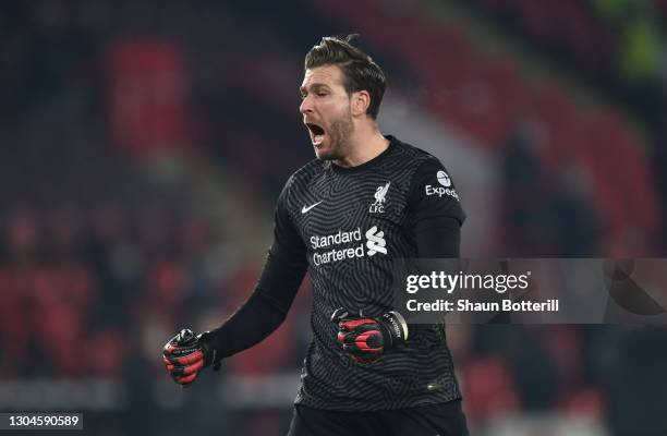 Adrian of Liverpool celebrates after their side's second goal scored by Roberto Firminho during the Premier League match between Sheffield United and...