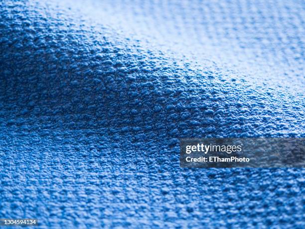 yoga exercise mat made of blue polymethane rubber foam - beach mat stock pictures, royalty-free photos & images