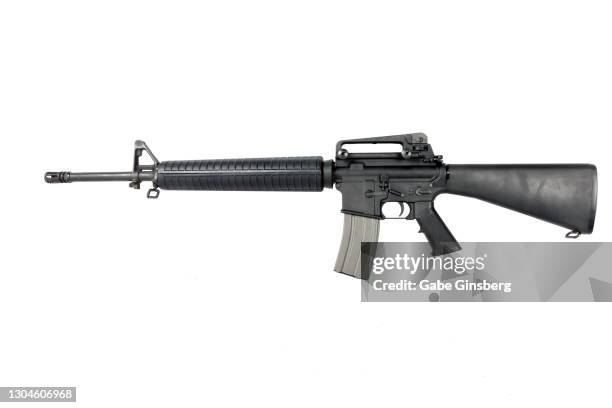 guns : close up of a m16 assault rifle on white background - ライフル ストックフォトと画像