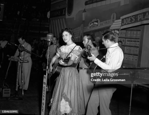 Country singer Ellen Muriel Deason professionally known as Kitty Wells performs on stage circa 1950 in Nashville, Tennessee.