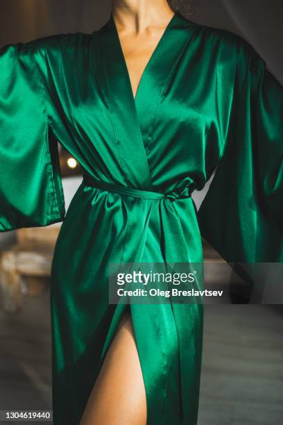 beautiful close-up details of green silk elegant and glamour nightie dress - luxury pyjamas stock pictures, royalty-free photos & images
