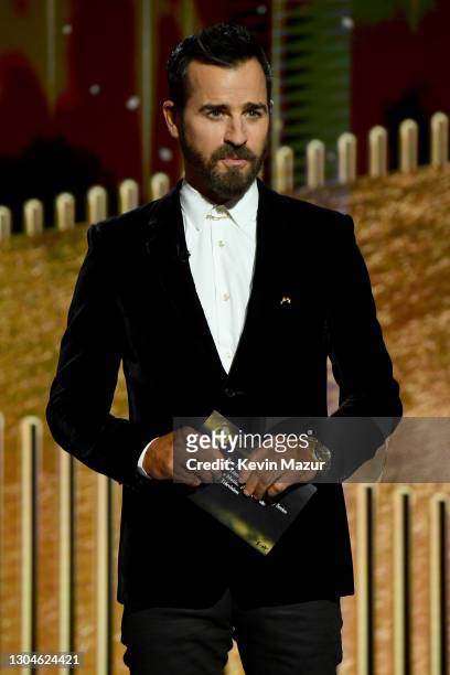 Justin Theroux presents the award for Best Actor - Television Motion Picture onstage during the 78th Annual Golden Globe® Awards at The Rainbow Room...