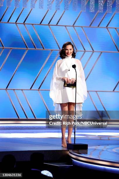 78th Annual GOLDEN GLOBE AWARDS -- Pictured: Gal Gadot speaks onstage at the 78th Annual Golden Globe Awards held at The Beverly Hilton and broadcast...