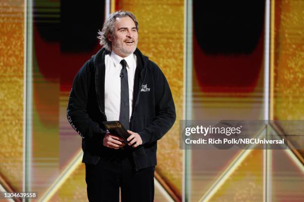 78th Annual GOLDEN GLOBE AWARDS -- Pictured: Joaquin Phoenix speaks onstage at the 78th Annual Golden Globe Awards held at The Beverly Hilton and...