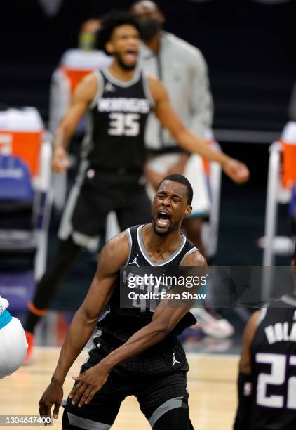 Harrison Barnes of the Sacramento Kings reacts after dunking the ball against the Charlotte Hornets in the fourth quarter at Golden 1 Center on...