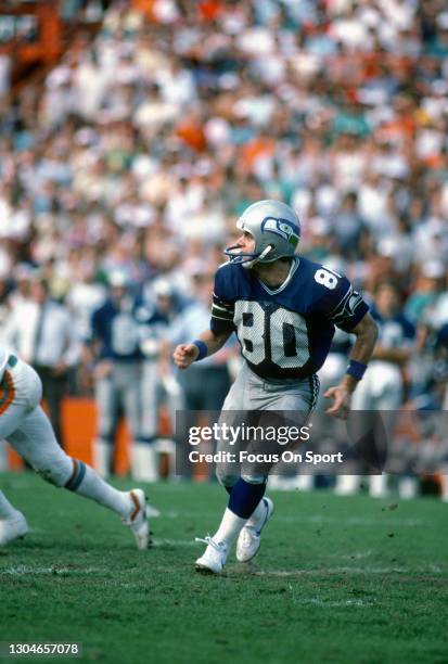 Steve Largent of the Seattle Seahawks in action against the Miami Dolphins during the AFC Divisional Playoff Game on December 31, 1983 at the Orange...