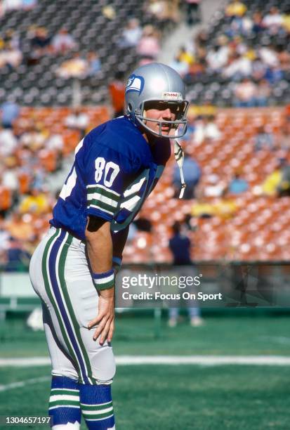 Steve Largent of the Seattle Seahawks looks on against the Miami Dolphins during an NFL football game on September 9, 1979 at the Orange Bowl in...