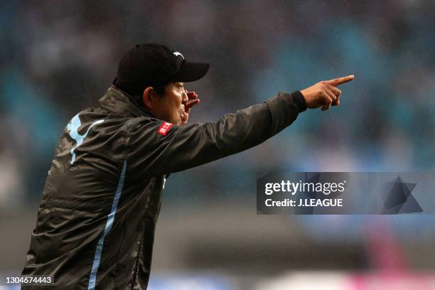 Head coach Yahiro Kazama of Kawasaki Frontale gives instruction during the J.League J1 match between Sagan Tosu and Kawasaki Frontale at the Best...