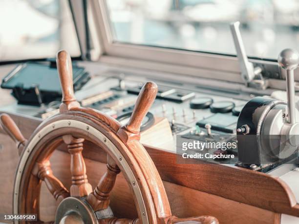 close up of the control cabin of a motor boat. - throttle stock pictures, royalty-free photos & images
