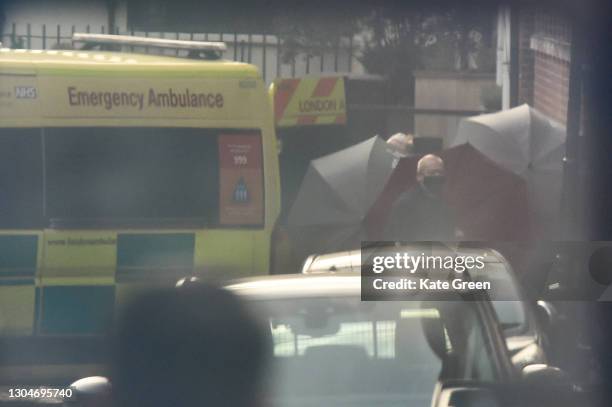 An ambulance leaves the King Edward VII hospital where Prince Philip, Duke of Edinburgh is currently receiving treatment on March 1, 2021 in London,...