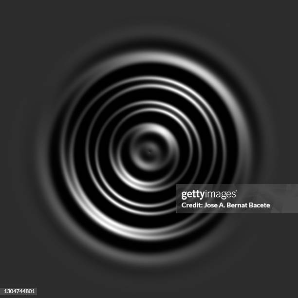 full frame of concentric circles on a moving liquid surface. - wasserkreise stock-fotos und bilder