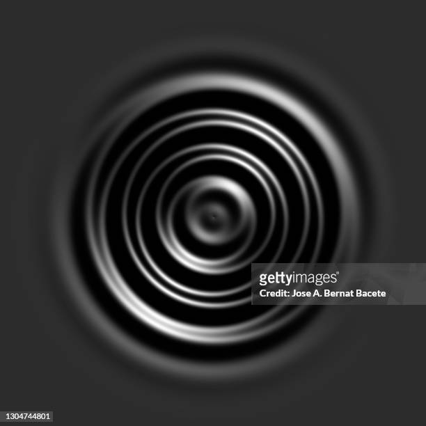 full frame of concentric circles on a moving liquid surface. - onde circolari foto e immagini stock