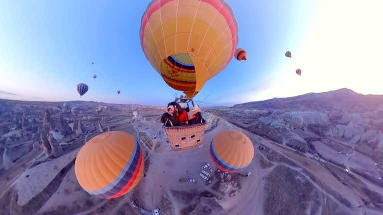 https://media.gettyimages.com/id/1304757444/video/cappadocia-flight-in-a-hot-air-balloon-360-3d-over-capture.jpg?b=1&s=640x640&k=20&c=w9-GIGEAaXM4ahZMi6ZkTpf_fZeHi5kTD9UurSfJ8xE=