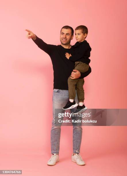 handsome single father and son. - seven point stock pictures, royalty-free photos & images