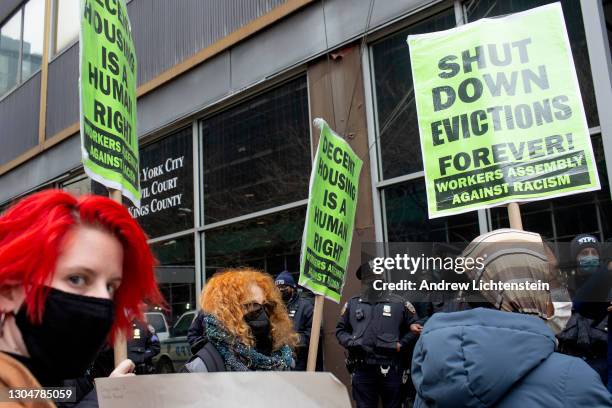 On the day that New York State's COVID-19 moratorium on rent expires, tenant rights activists hold a demonstration outside Civil Court where eviction...