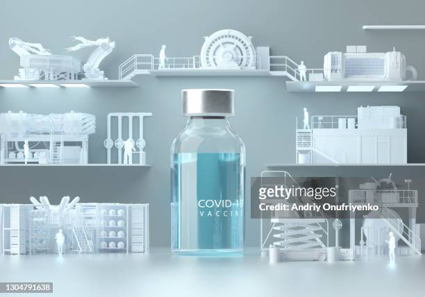 huge bottle with covid-19 vaccine standing in the middle of production line - biotech industries images stock pictures, royalty-free photos & images