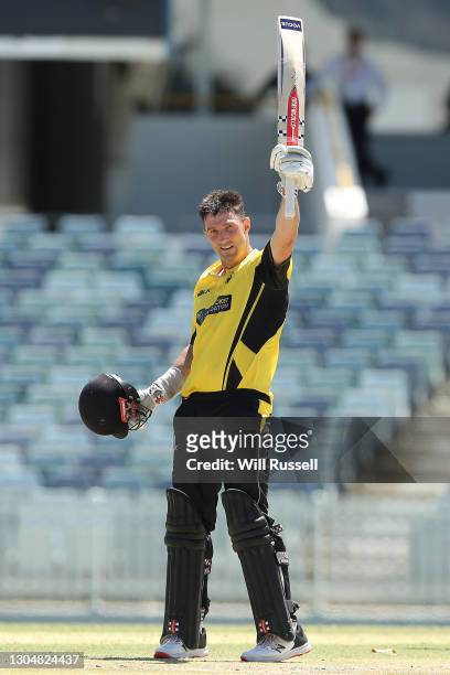 Shaun Marsh of the Warriors celebrates his century during the Marsh One Day Cup match between Western Australia and South Australia at WACA on March...