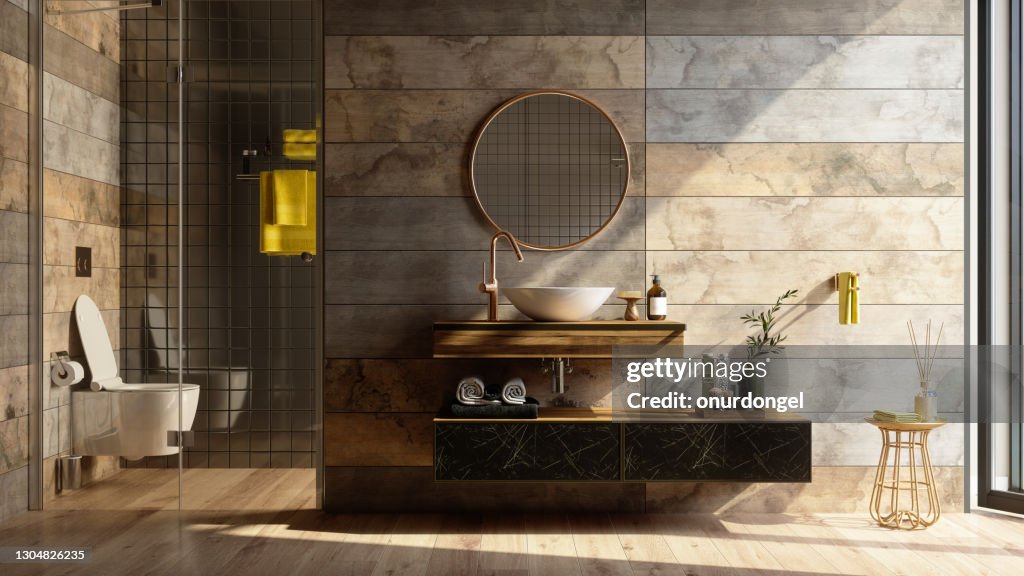 Intérieur de salle de bains de luxe avec douche, toilette, miroir et serviettes jaunes.