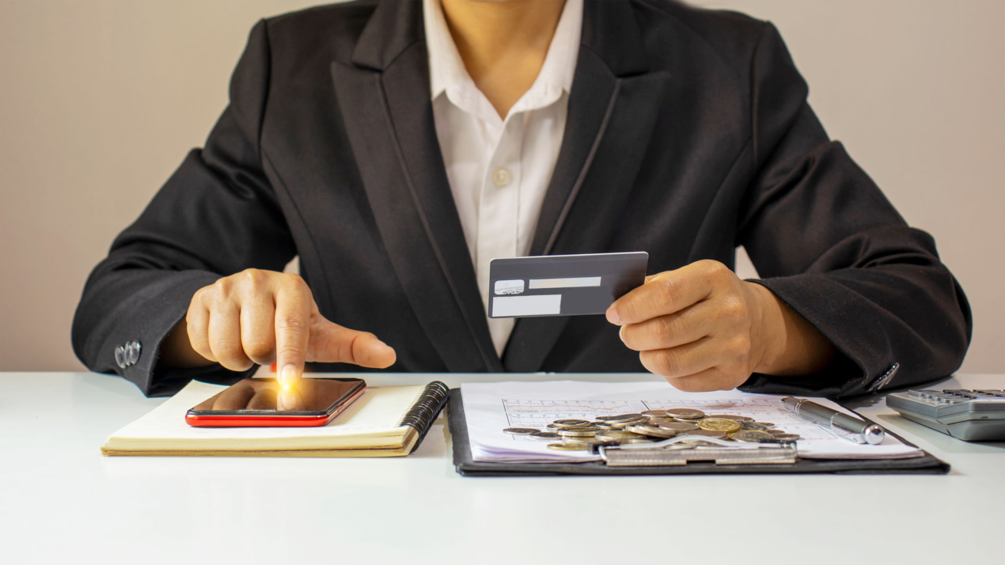 Asian woman paying by credit card online while ordering online at home, transaction idea using mobile banking application. Asian woman paying by credit card online while ordering online at home, transaction idea using mobile banking application.