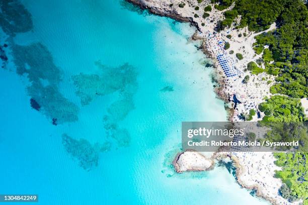 punta della suina beach by turquoise sea, apulia - salento foto e immagini stock