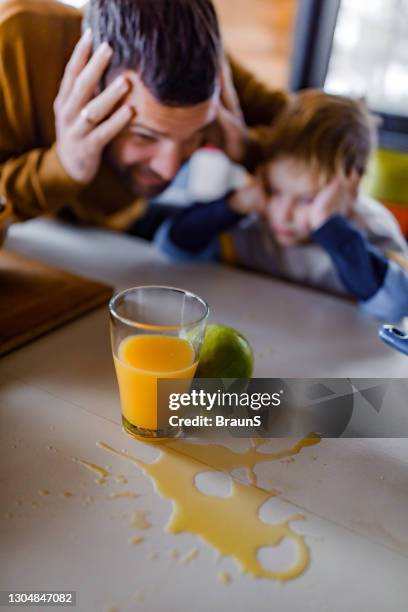 oh no, we spilled juice! - spilled drink stock pictures, royalty-free photos & images