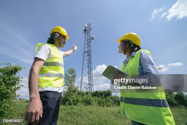 Engineer Field Work Image Engineers Working On The Field Near A Telecommunications Tower Teamwork ...