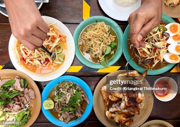 delicious northeastern food on thailand. - thai food stock pictures, royalty-free photos & images