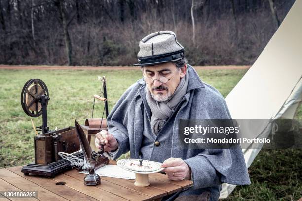 American Civil War, Confederate Army. Intelligence Unit with hot-air balloon. Confederate Army's Communications officer writing an encoded message...