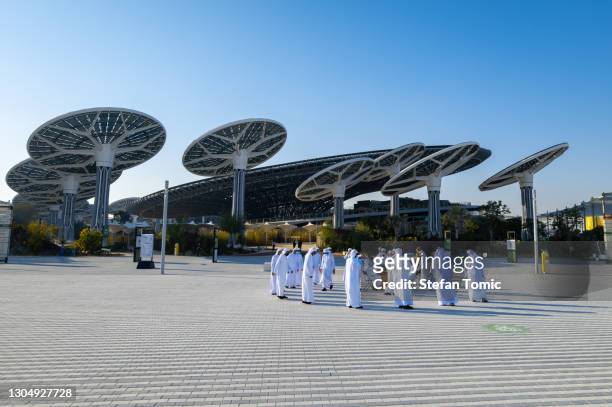 expo 2020: emirati artists performing in front of terra pavilion for the postponed expo which will be held in 2021 in the uae - expo 2020 dubai stock pictures, royalty-free photos & images