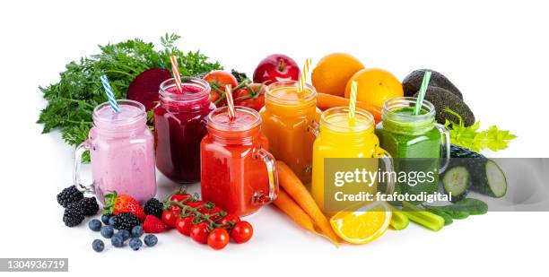 healthy rainbow colored fruits and vegetables smoothies isolated on white background - vegetable juice stock pictures, royalty-free photos & images