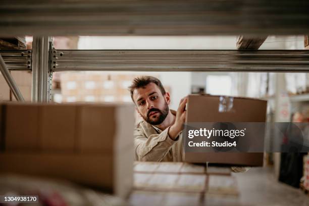 manufacturing business person - storage room boxes stock pictures, royalty-free photos & images