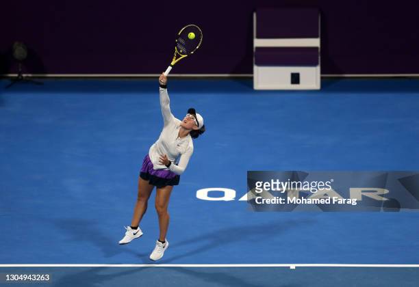 Saisai Zheng of China serves during the Women's Singles match between Saisai Zheng and Misaki Doi on Day Two of the WTA Qatar Total Open at Khalifa...
