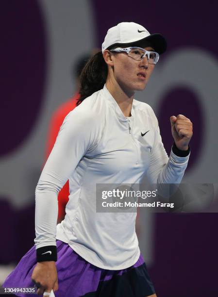 Saisai Zheng of China reacts during the Women's Singles match between Saisai Zheng and Misaki Doi on Day Two of the WTA Qatar Total Open at Khalifa...