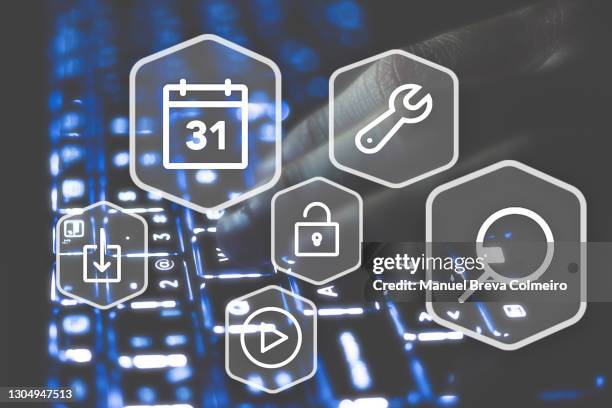 laptop and icons - programmierschnittstelle stock-fotos und bilder