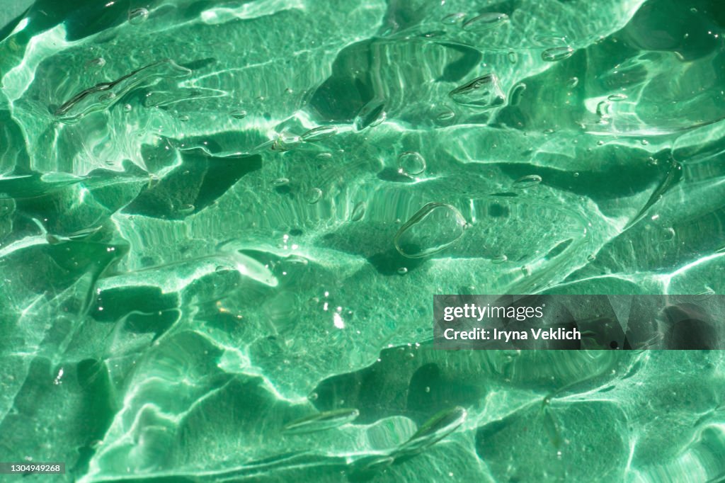 Texture of Water gel smudge from aloe vera, abstract background.