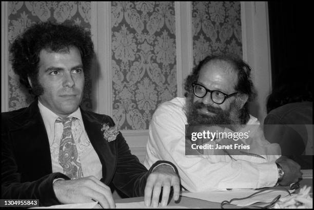 View of American political and social activist Jerry Rubin and poet Allen Ginsberg during a press conference for People to Investigate Leary's Lies ,...