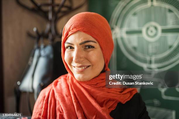 portrait of muslim woman - turkish ethnicity stock pictures, royalty-free photos & images