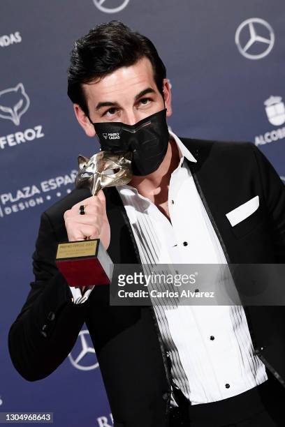 Mario Casas poses in the Press Room after winning the Best Film Actor Award during 'Feroz Awards' 2021 at Hotel VP Plaza España Design on March 02,...
