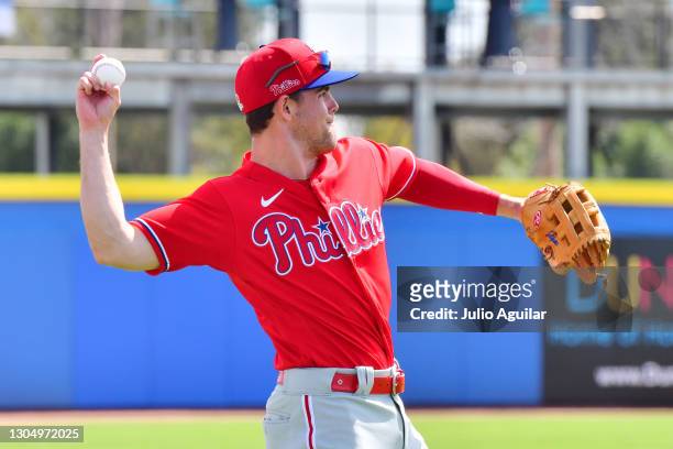 Scott Kingery of the Philadelphia Phillies warms up before a spring training game against the Toronto Blue Jays on March 02, 2021 at TD Ballpark in...
