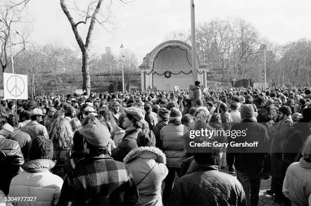 View of fans gathered at the Central Park bandshell during a memorial vigil for murdered musician John Lennon, New York, New York, December 14, 1980....