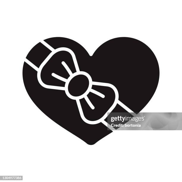box of chocolates romance glyph icon - chocolates box stock illustrations
