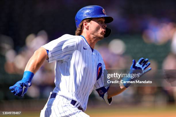 Nico Hoerner of the Chicago Cubs doubles during the first inning of a preseason game against the Kansas City Royals on March 02, 2021 in Mesa,...