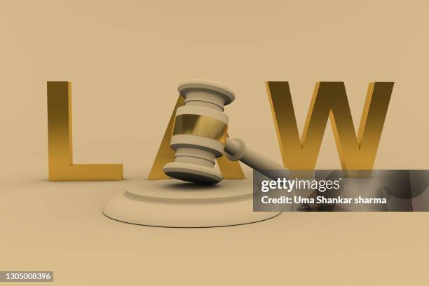 gavel with law text against off  white background - indian crime law and justice stock pictures, royalty-free photos & images