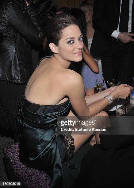 Actress Marion Cotillard attends the Weinstein Company Golden Globes after party co-hosted by Martini held at BAR 210 at The Beverly Hilton Hotel on...