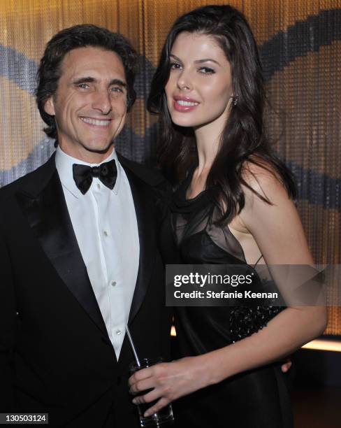 Producer Lawrence Bender and guest attend the Weinstein Company Golden Globes after party co-hosted by Martini held at BAR 210 at The Beverly Hilton...